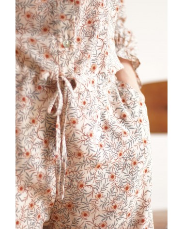 Combinaison pantalon cintrée à la taille avec des poches